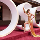 Oscar nominee Andra Day arrives on the red carpet of The 93rd Oscars on Sunday, April 25, 2021.